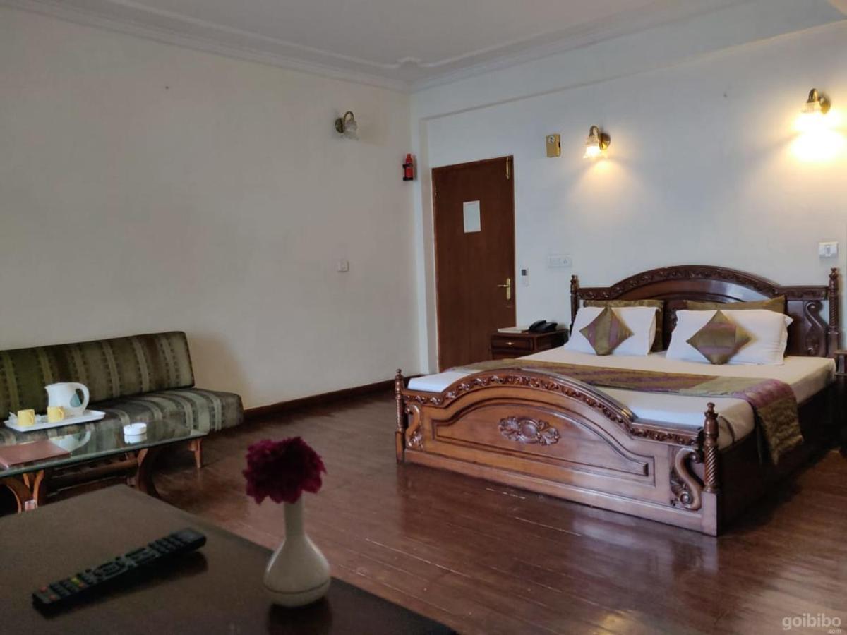 Hotel Blossom Shimla Buitenkant foto