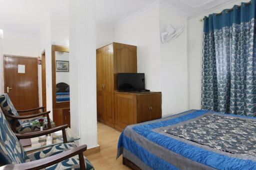 Hotel Blossom Shimla Buitenkant foto